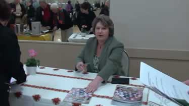 Joan Brander at book signing About the Pysanka It Is Written!